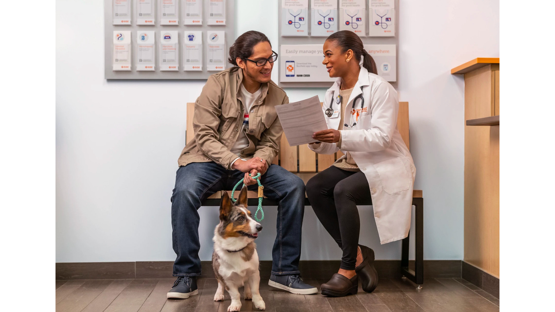 a vet talking to a pet owner